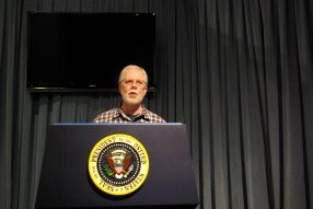 Ed Darrell at the Presidential Podium (mockup, at George H. W. Bush Library), 2011