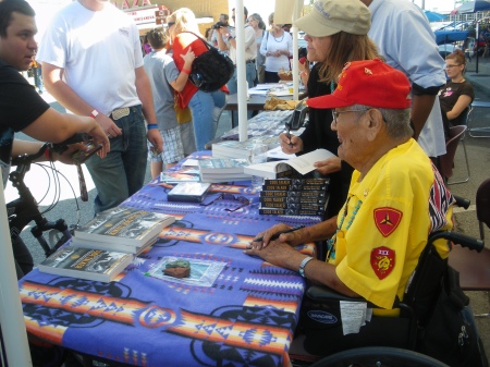 Navajo Code Talker, Marine Chester Nez, signing copies of his book, Code Talker, in Carrollton, Texas, October 14, 2012; photo by Ed Darrell