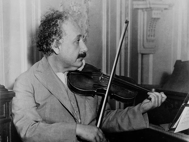 Einstein playing his violin in 1931, aboard the S.S. Belgenland, travelling from New York to San Diego. Vintage Everyday image. 