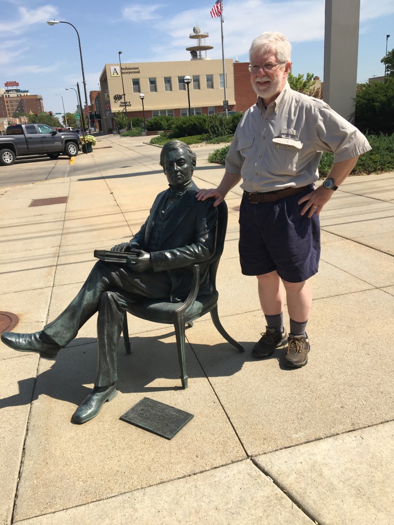 The author and a bronze likeness of Fillmore meet on a street in Rapid City, South Dakota, August 2016