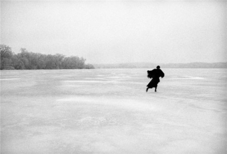 Joni Mitchell skating on a river, photo by Joel Bernstein